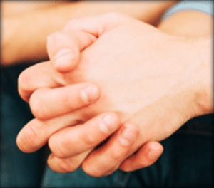 clasping hands together